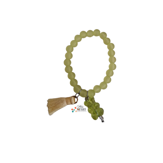 Green Beaded Bracelet with Tassel & Charm